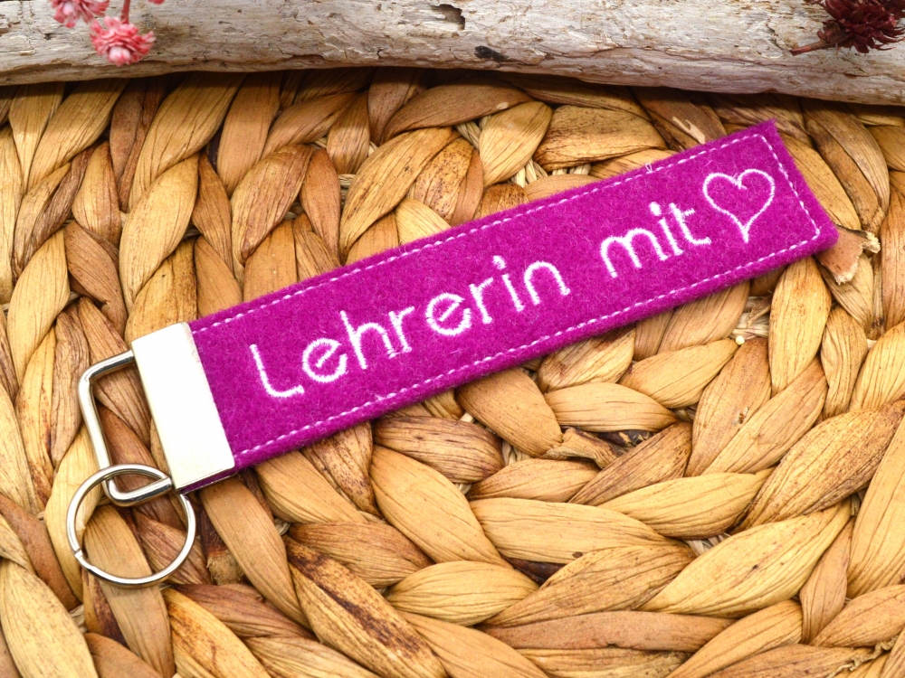 Bild 1 von Schlüsselanhänger Lehrerin mit Herz  / (Variante) Filz pink/ weiße Schrift