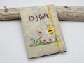 UHefthülle aus Filz mit Biene und Blumenwiese
